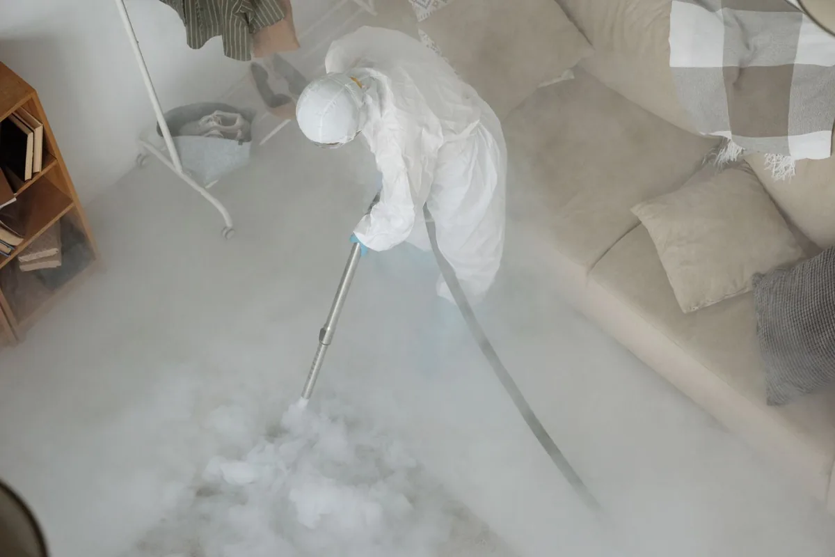 Biohazard cleanup technician in protective equipment, Southfield, MI